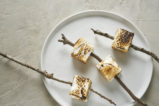 Summer Treat of Toasted Marshmallows on Sticks