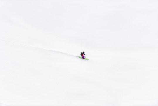 Side view of male skier on the snow slope