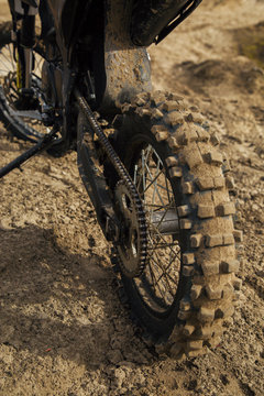 The wheel of a dirt bike