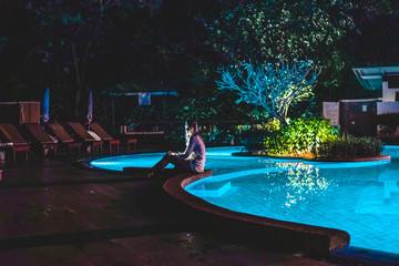 Girl Near Swimming Pool at a Resort