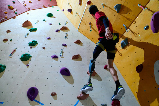 Disabled athlete doing climbing