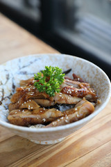 japanese food , Chicken teriyoki with rice on wood background