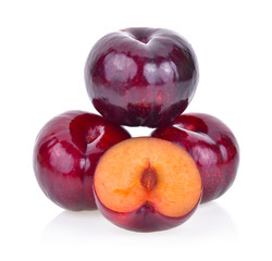 Red plum fruit on white background