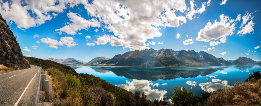 180 degrees Viewpoint Panorama overlooking Lake Wakatipu at Bennett's Bluff Lookout at golden hour, one of the most the scenic drives in New Zealand