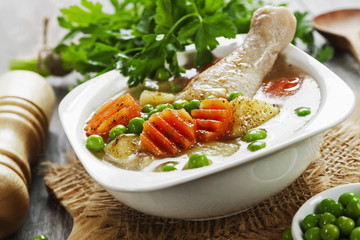 Chicken soup with green peas