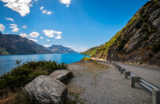 The winding road along the shore of Lake Wakatipu at Devil Staircase scenic lookout, not far from Queenstown, in the Southern Island of New Zealand.
