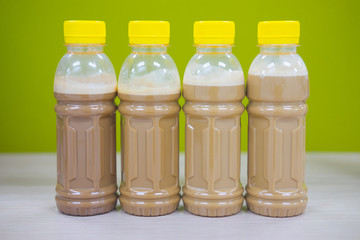 Four coffee in plastic bottle