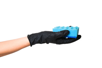 Hand in a black glove holds a sponge for washing dishes