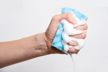 Sponge for washing dishes in hand