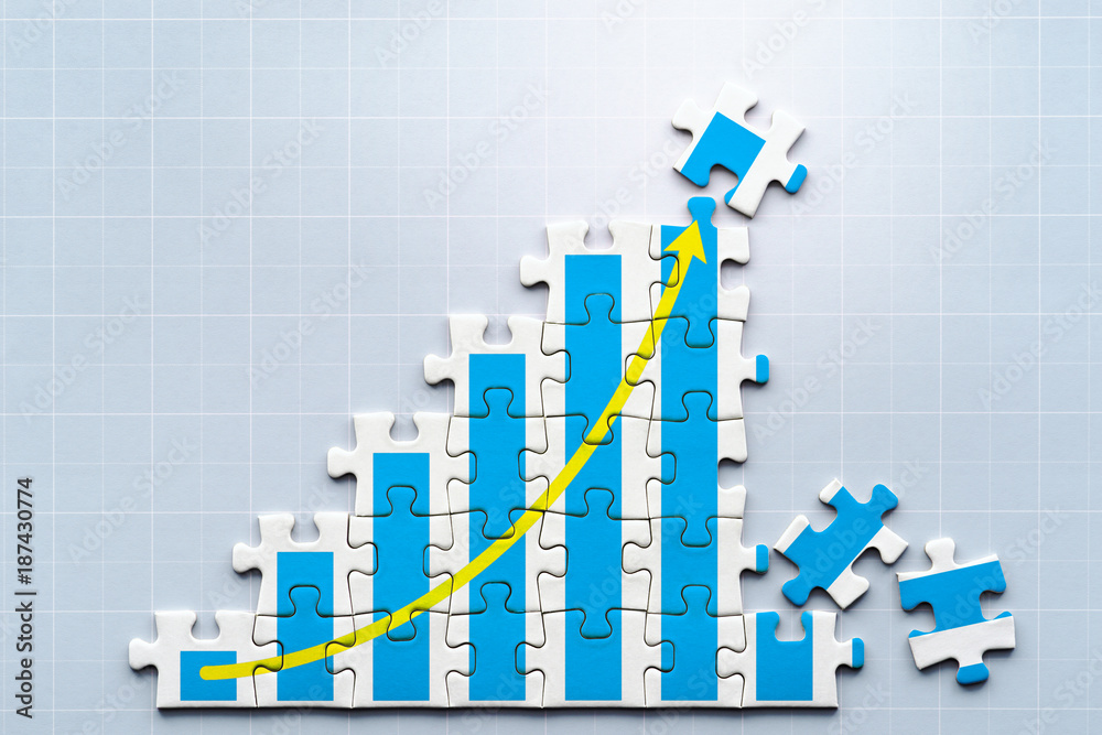 Poster Creation of growth. Growth chart drawn on puzzle. Working on puzzle. Reflection squared background.