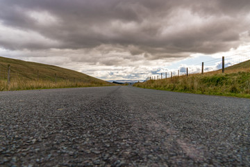 Rural road on a cloud day, near Ystradfellte in Powys, Wales, UK