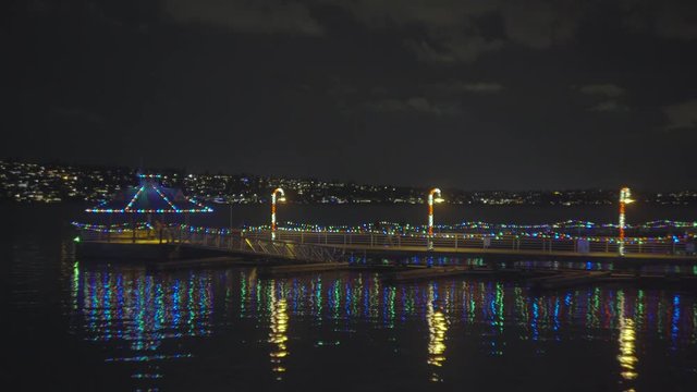 Colorful lights on the night coast, Seattle, Washington. Motion video. 4K, 3840*2160, high bit rate, UHD