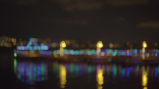Colorful lights on the night coast, Seattle, Washington. Motion video. 4K, 3840*2160, high bit rate, UHD
