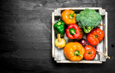 Fresh vegetables in a small box. © Artem Shadrin