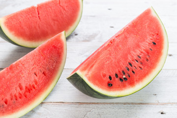 Watermelon on wooden table background