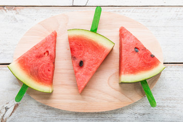 Watermelon on wooden table background