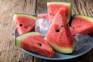 Watermelon on wooden table background