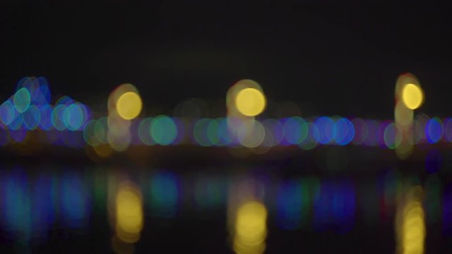 Colorful lights on the night coast, Seattle, Washington. Motion video. 4K, 3840*2160, high bit rate, UHD