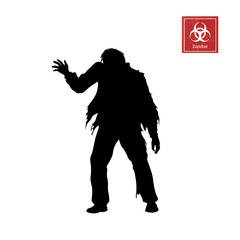 Black silhouette of zombie on white background. Isolated image of undead monster © shaineast