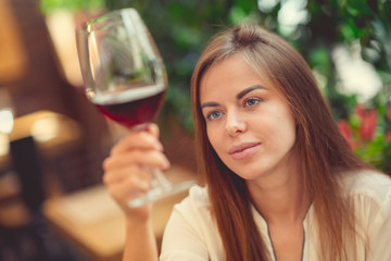 Woman tasting a wine