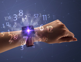 Close up hand with smartwatch and numbers