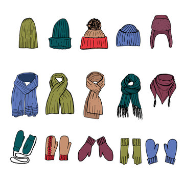 Set of hand drawn winter accessories: caps, gloves and scarfs in color. Isolated vector illustration