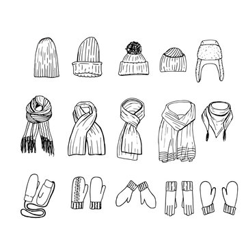 Set of hand drawn winter accessories: caps, gloves and scarfs in monochrome.