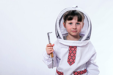Kid in beekeeper's suits posing in studio white background.