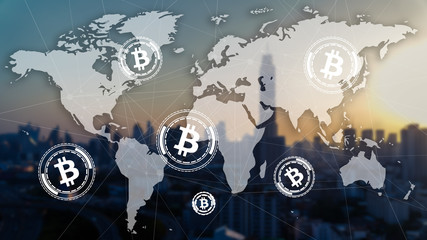 Double exposure of city scape and worldmap with bitcoin icons.
