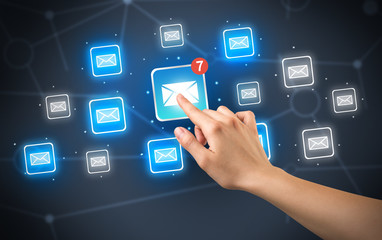 Hand touching mail icon