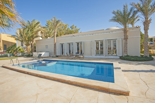 Swimming pool at at luxury tropical holiday villa