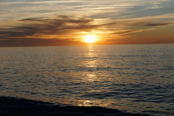 sunrise at the edge of the mediterranean sea