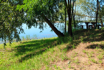Сamping pitch on summer lake calm beach