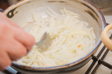 Onions to be pan fried. Fried onions.