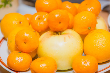 Tangerines fruit. Tangerines lie on a table. Fresh fruit.