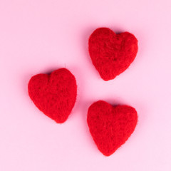 red hearts on rosa background