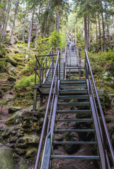 Stairs on the rock with remains of Strmen Castle in Teplice Rocks, part of Adrspach-Teplice landscape park in Czech Republic