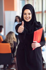 beautiful modern Muslim businesswoman portrait in office