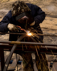 Sparks from welding at the construction site