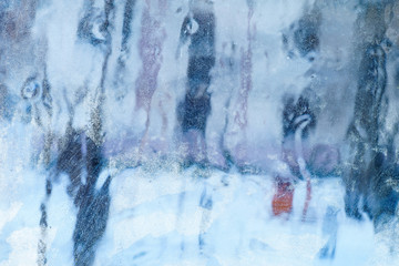 Obraz na płótnie Canvas Frosty pattern on the window. Beautiful natural background. Winter theme. Close-up