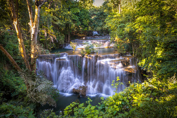 Fototapeta na wymiar Smooth Waterfall in the Forest. Huay Mae Khamin Waterfall at Sri Nakarin National Park, Kanchanaburi Province, Thailand.
