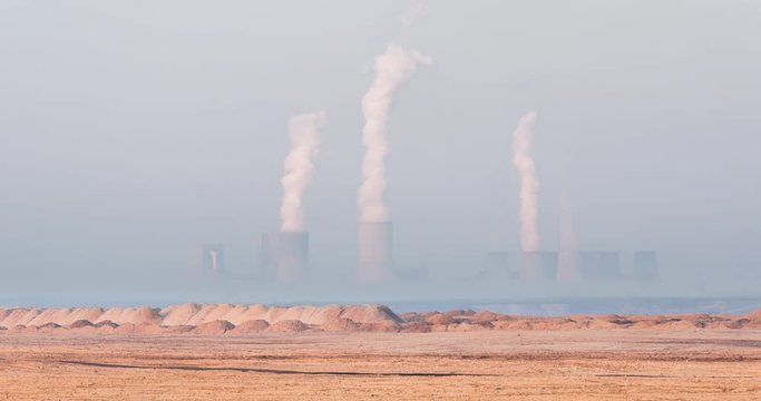 Coal fired power plant in the morning timelapse