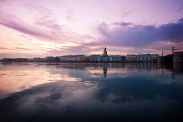 Fototapeta premium Museum of Anthropology and Ethnography Kunstkamera founded by Peter the First in St. Petersburg on the Neva embankment against the backdrop of a beautiful sunset. Summer. Spring. Vasilievsky Island. R
