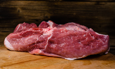 Raw pork meat on cutting board