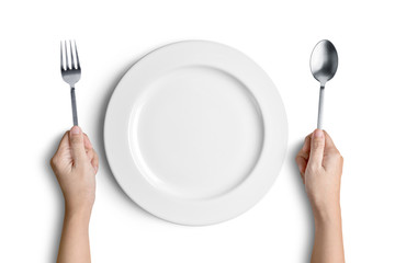 White plate with silver fork and spoon with clipping path