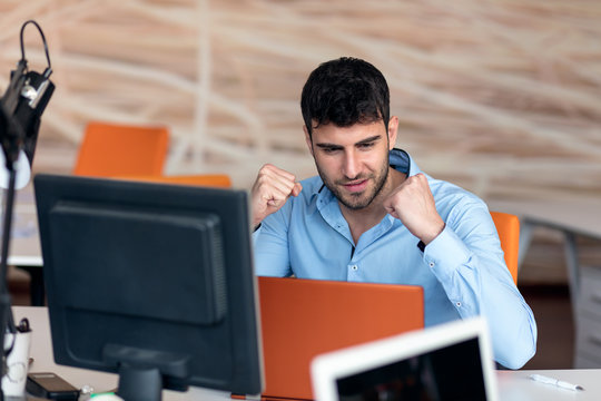 Freelance programmer working in startup office