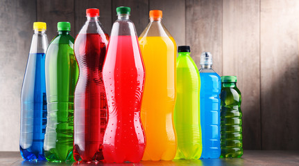 Plastic bottles of assorted carbonated soft drinks