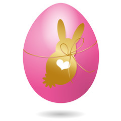 Osterei mit dekorativem goldenen Osterhase mit Herz  und goldener Schleife