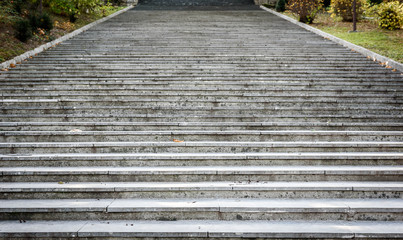Fototapeta premium Old, majestic, grand, granite stone staircase leading up texture.
