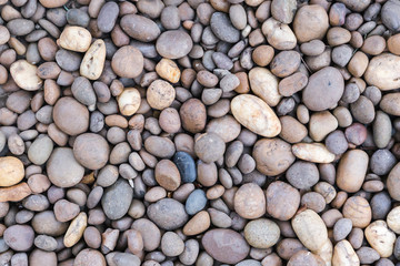 Stone pebbles texture or stone pebbles background for interior design business. exterior decoration and industrial construction idea concept design. Stone pebbles motifs that occurs natural.